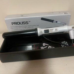 32/32mm Barrel Black And White Proliss curling Iron in excellent condition.